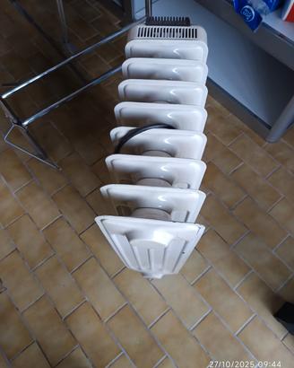 lettino massaggio e calorifero elettrico