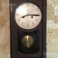 Orologio a pendolo antico