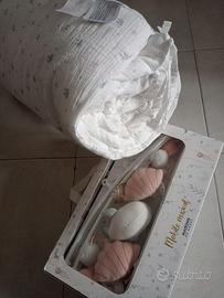 Giostra per lettino con il suo paracolpi.