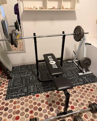 Panca piana completa di bilancieri manubri e rack