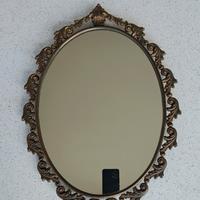 specchio ovale in ottone