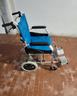 sedia a rotelle pieghevole