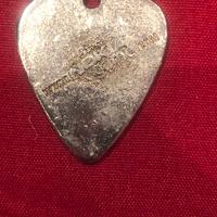Plettro p/chitarra metallico c/logo Nokia Game