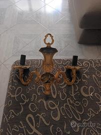 due applicchi di ottone puro  pari al nuovo 