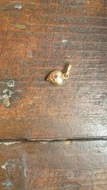 Ciondolo oro giallo 18 carati  a  cuore con rubino