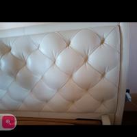 Letto testata  in vera pelle  Poltrona Frau