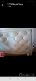 Letto testata  in vera pelle  Poltrona Frau