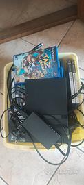 ps2 slim + tutti i giochi in foto 