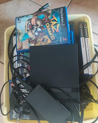 ps2 slim + tutti i giochi in foto 