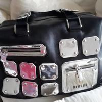 Borsa versus in vera pelle