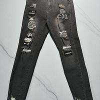 Jeans strappatti grigio scuro,taglia media!!