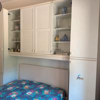 Armadio a ponte con letto