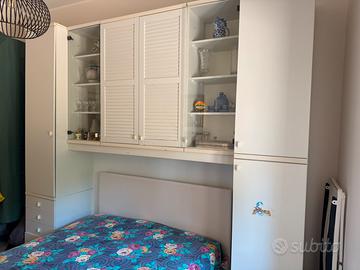 Armadio a ponte con letto