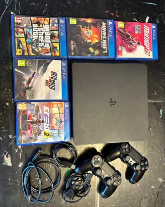 PS4 Slim + 2 Controller + 5 Videogiochi + Accesori
