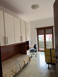 Camera in appartamento condiviso