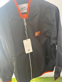 Giacca Hermes nera e arancione 