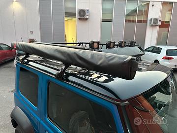 Portapacchi Suzuki Jimny con faretti e tendalino