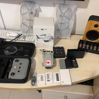 DJI Mini 2 + DJI MINI 1 + batterie molti accessori