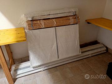 Letto singolo con cassettoni a scomparsa