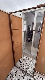 Scarpere salvaspazio a specchio