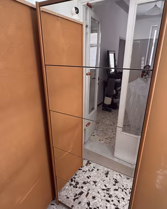 Scarpere salvaspazio a specchio