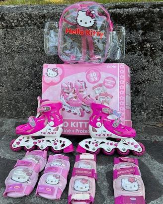Pattini regolabili bambina 30–33 + kit protezioni