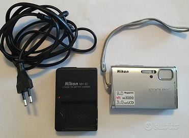 Nikon Coolpix S52 9MP + mini cavalletto