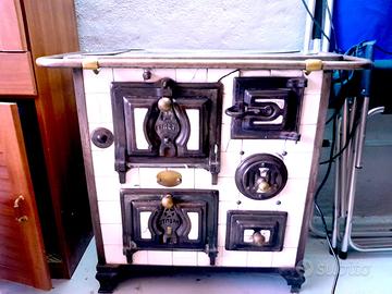 stufa in ceramica e ghisa ,marchio italia primi 90