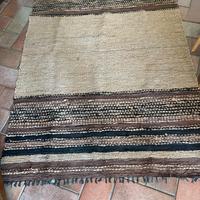 Tappeto in pelle intrecciata