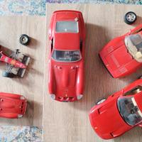 4  modelli Ferrari "Burago" + 1  Ferrari "Maisto"
