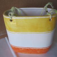 Vaso portafiori in ceramica con fori da appendere