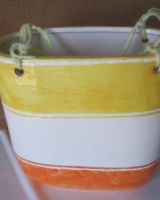 Vaso portafiori in ceramica con fori da appendere