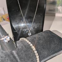 parure di gioielli in acciaio e zirconi 