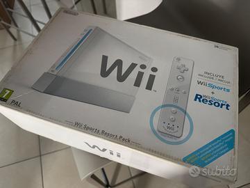 Wii con scatola e giochi aggiuntivi