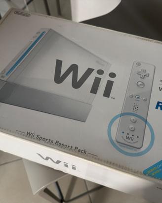 Wii con scatola e giochi aggiuntivi