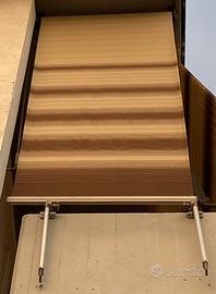 Tenda da sole avvolgibile usata