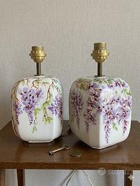 Coppia di basi ceramica bianca decorate a  mano