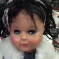  bambola antica in composizione.