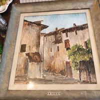 Quadro con paesaggio di campagna con cornice