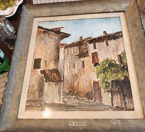 Quadro con paesaggio di campagna con cornice