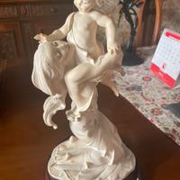 Statua donna con bambino