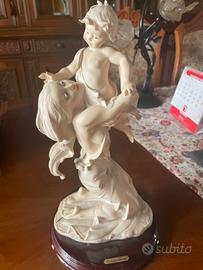 Statua donna con bambino