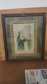 Antichissimo quadro con cornice in legno.