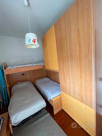 Cameretta angolare tre posti letto