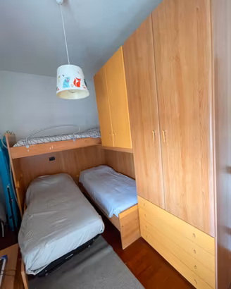 Cameretta angolare tre posti letto
