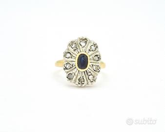 Anello in oro e argento con zaffiro