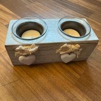 Porta candele con due candele