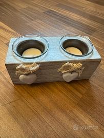Porta candele con due candele