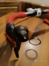 Manubrio in carbonio con leve Shimano 10*2