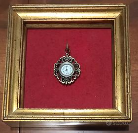 Quadro fiorentino e orologio in cornice bizantina